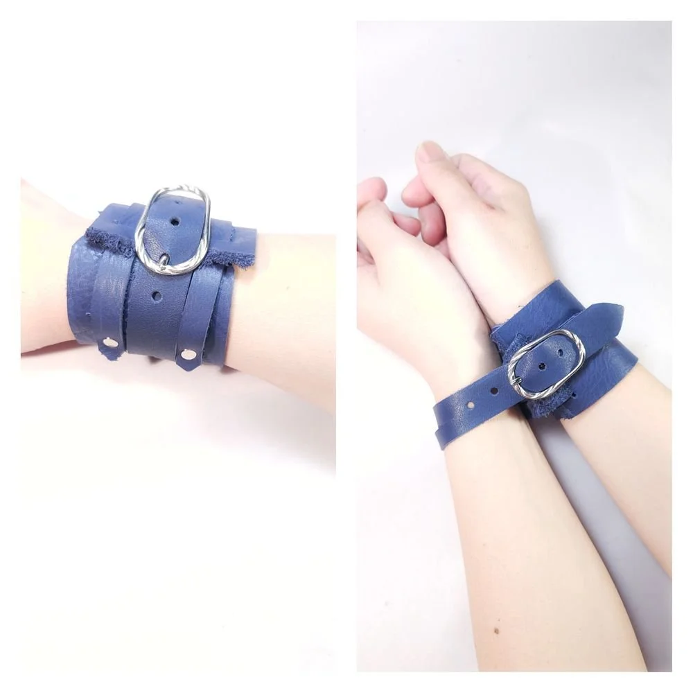Two images of a person's wrist wearing a blue leather bracelet with a silver buckle. The left image shows the bracelet close-up, and the right image shows the person with their hands clasped, offering a different angle of the bracelet.