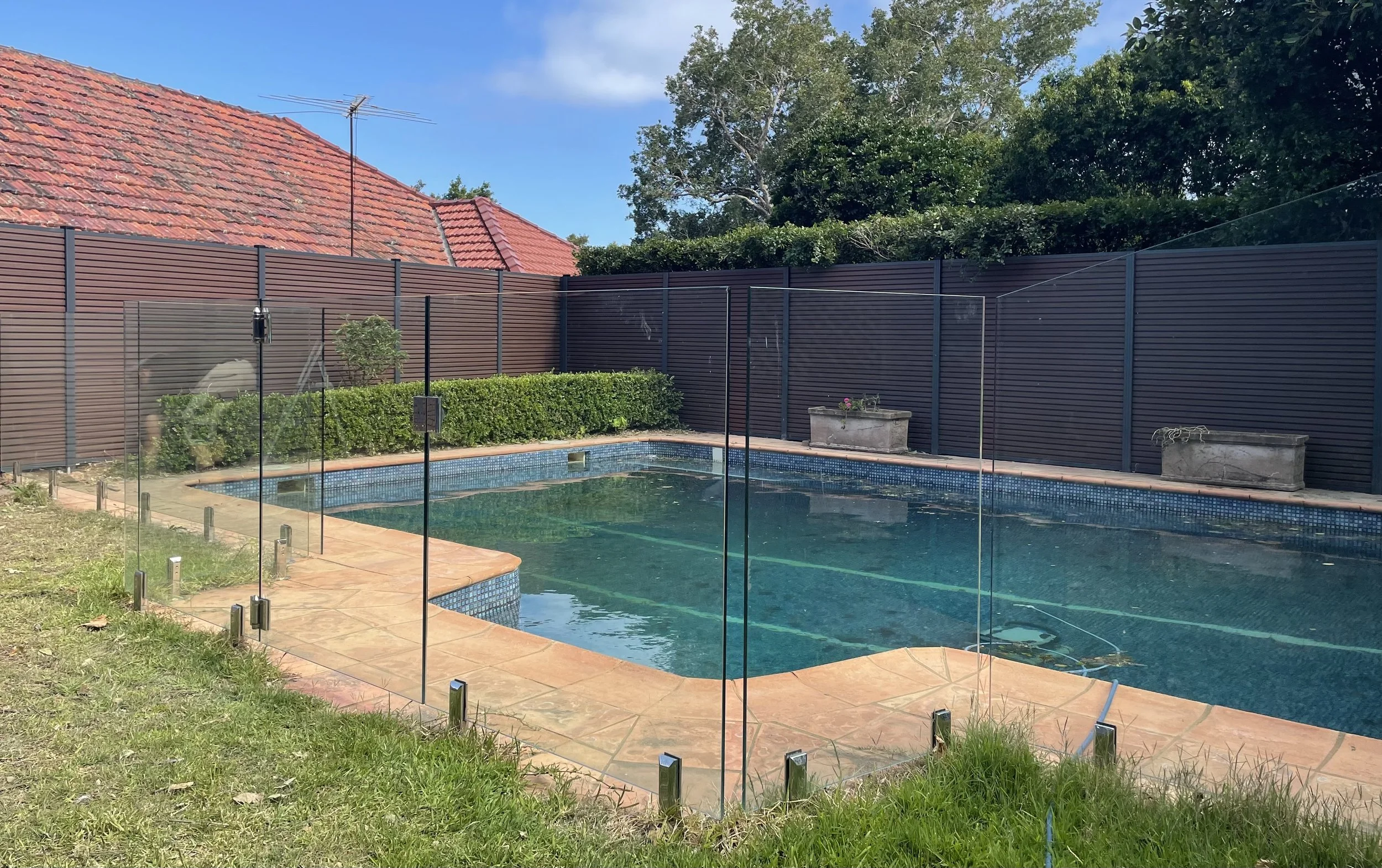 WPC Fencing vs Colorbond Fencing for Pool Safety: Which Is Better for Long-Term Compliance?