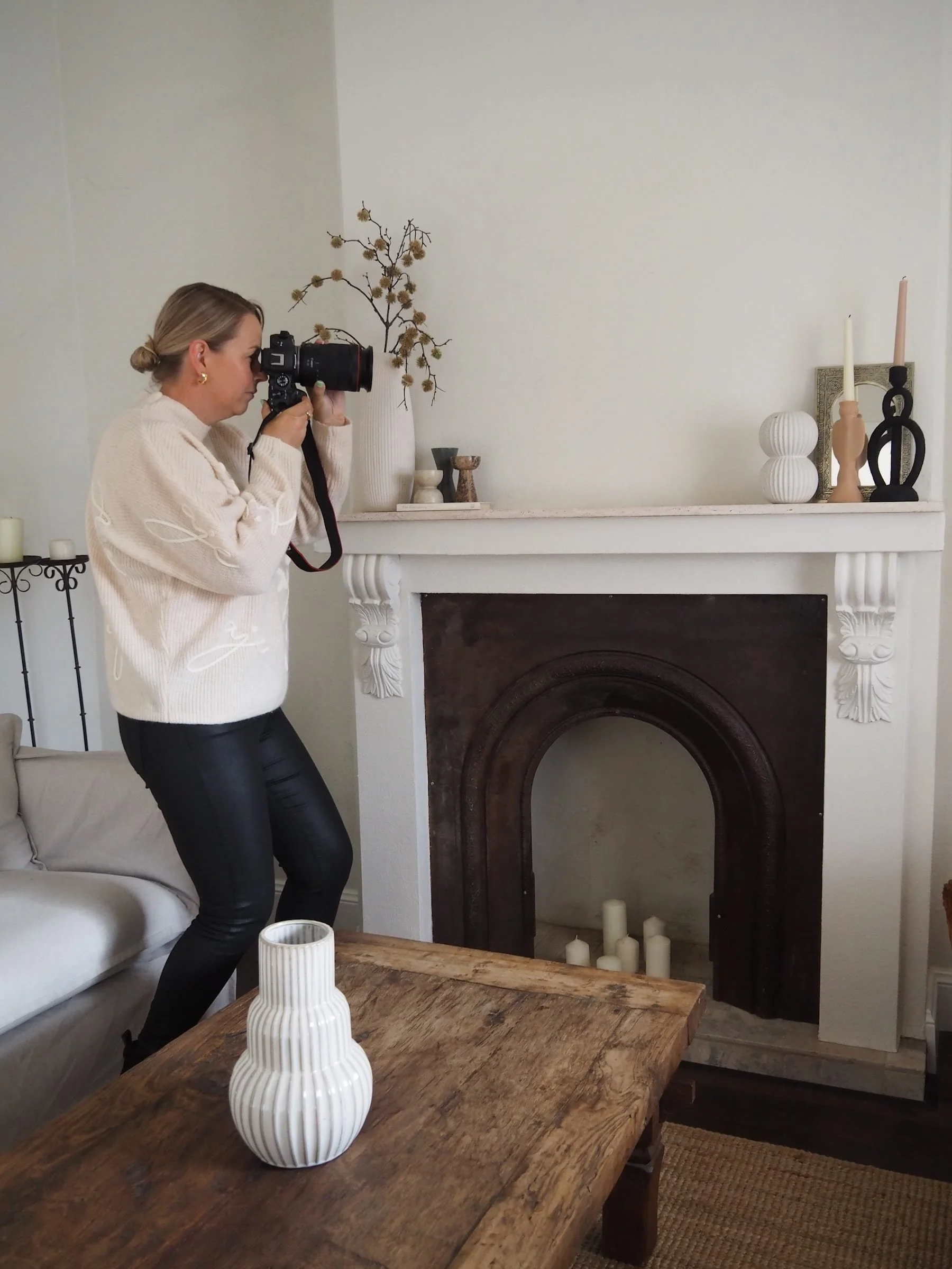 Laura Jones, an interior photographer based on the Sunshine Coast, shooting in a boutique accommodation lounge room