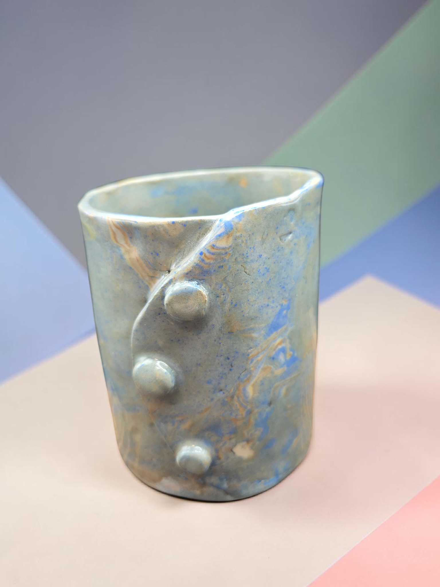 Blue marbled stoneware button mug