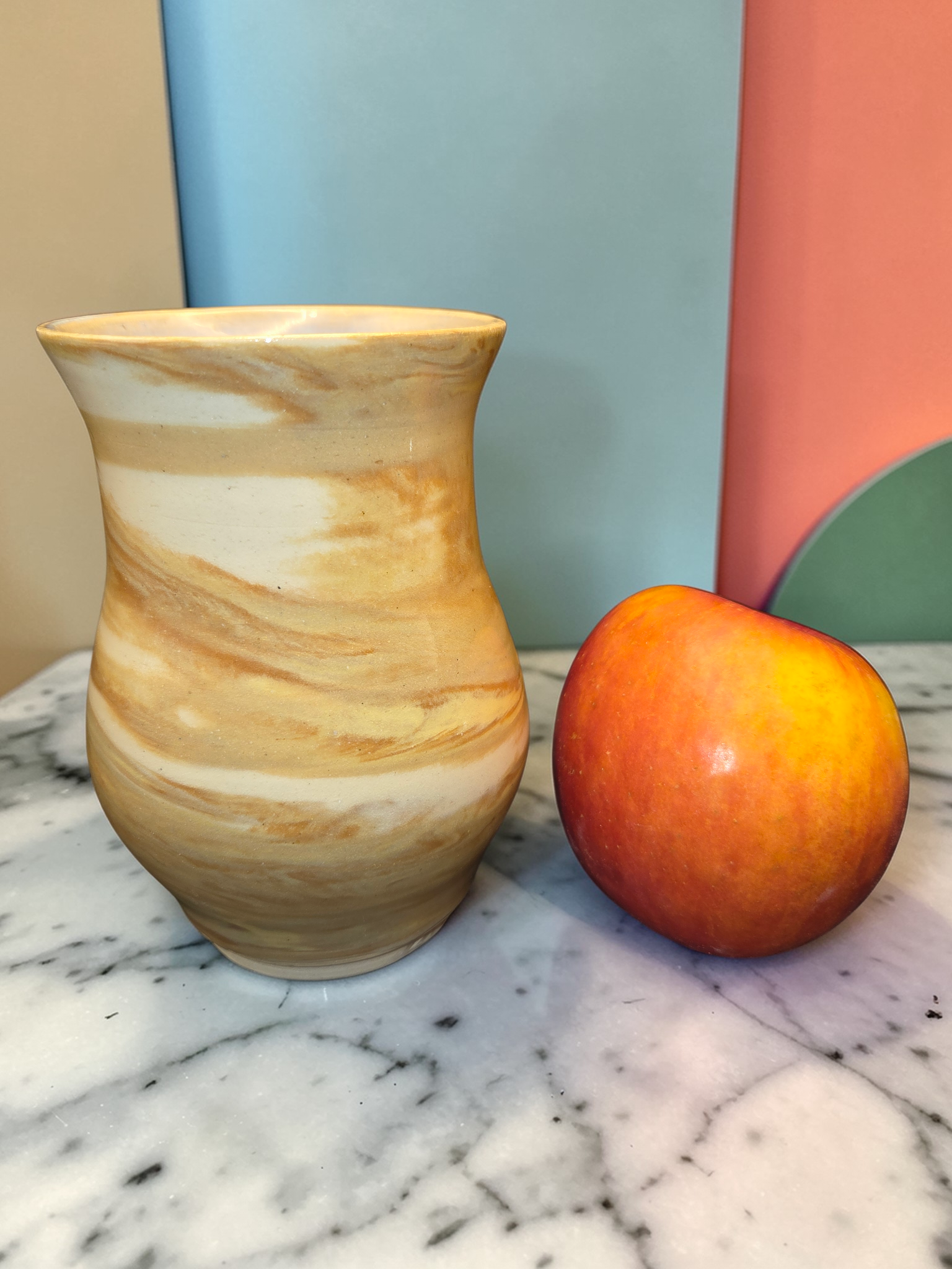 Tan and white agateware bud vase