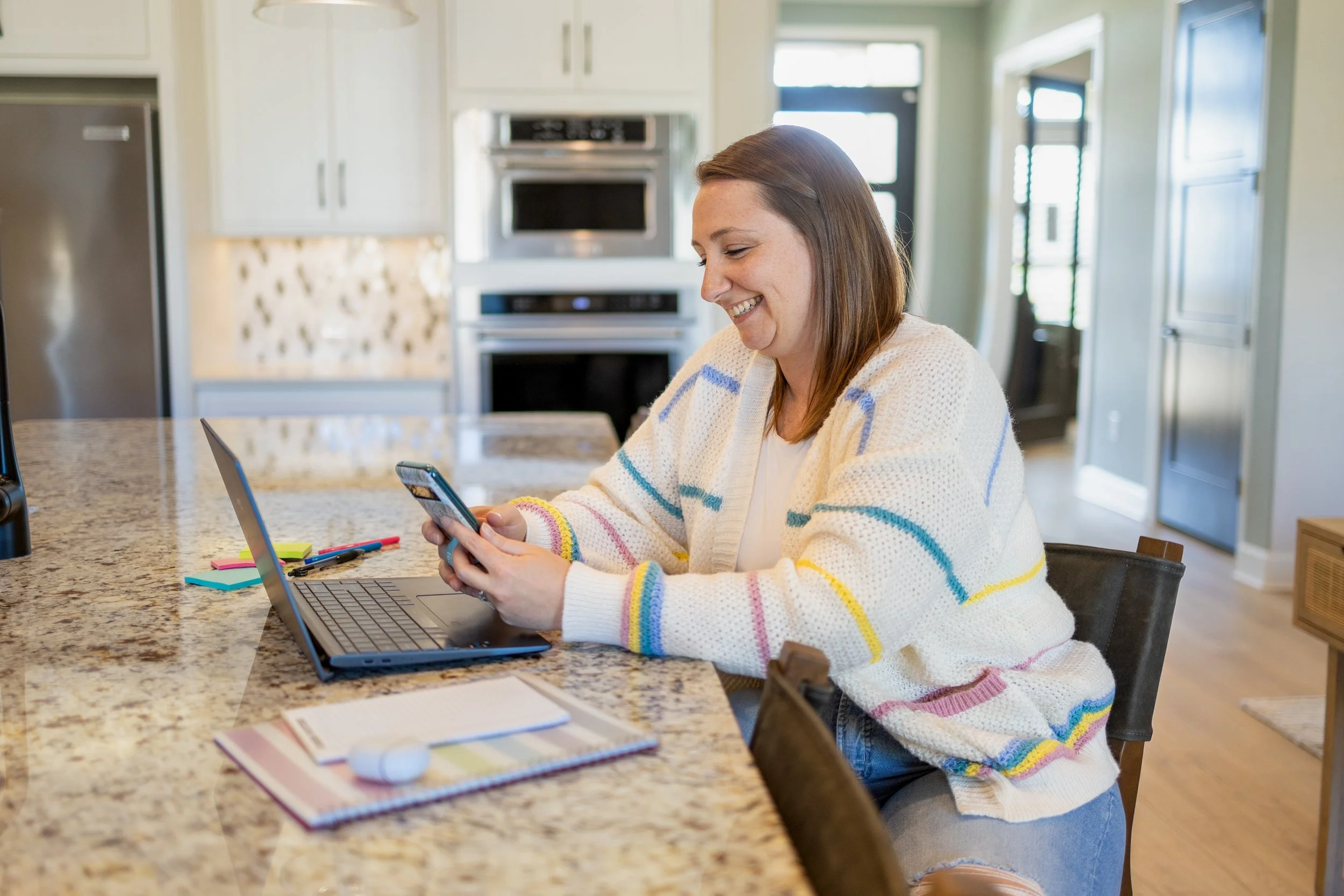 Confident business owner managing daily operations with the help of a strategic OBM.