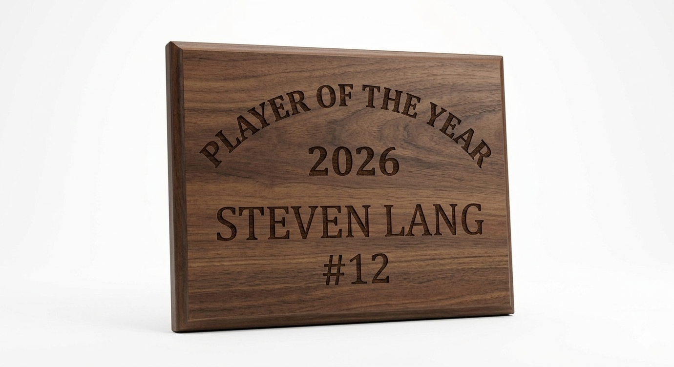 Wooden plaque engraved with "Player of the Year 2026 Steven Lang #12"