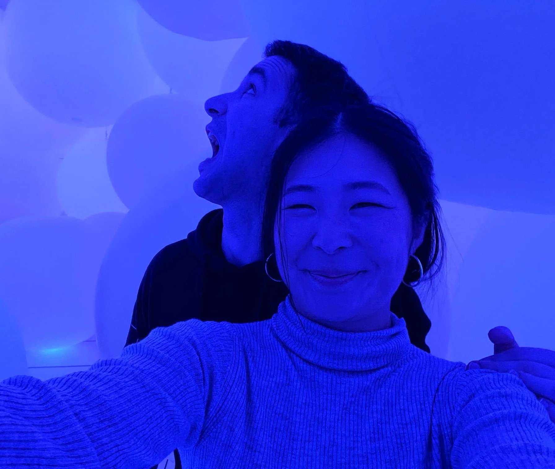 Keenan seeing balloons for the first time at TeamLab Tokyo. Shaina is putting up with him.