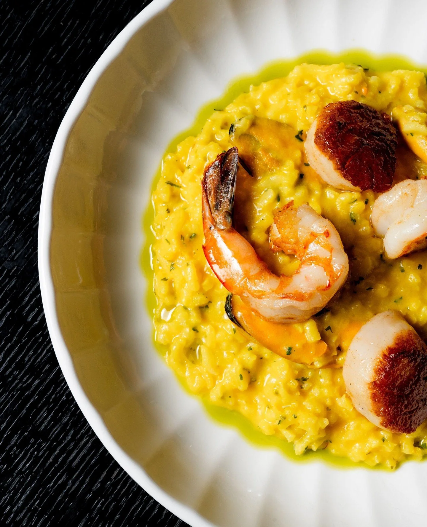 Golden saffron risotto with prawns, mussels and scallops, finished with a touch of mascarpone for richness. A taste of the sea, reimagined at Ottie&rsquo;s.⁠
⁠
#OttiesMelbourne #CrownePlazaMelbourne #MelbourneDining #SaffronRisotto #SeafoodRisotto