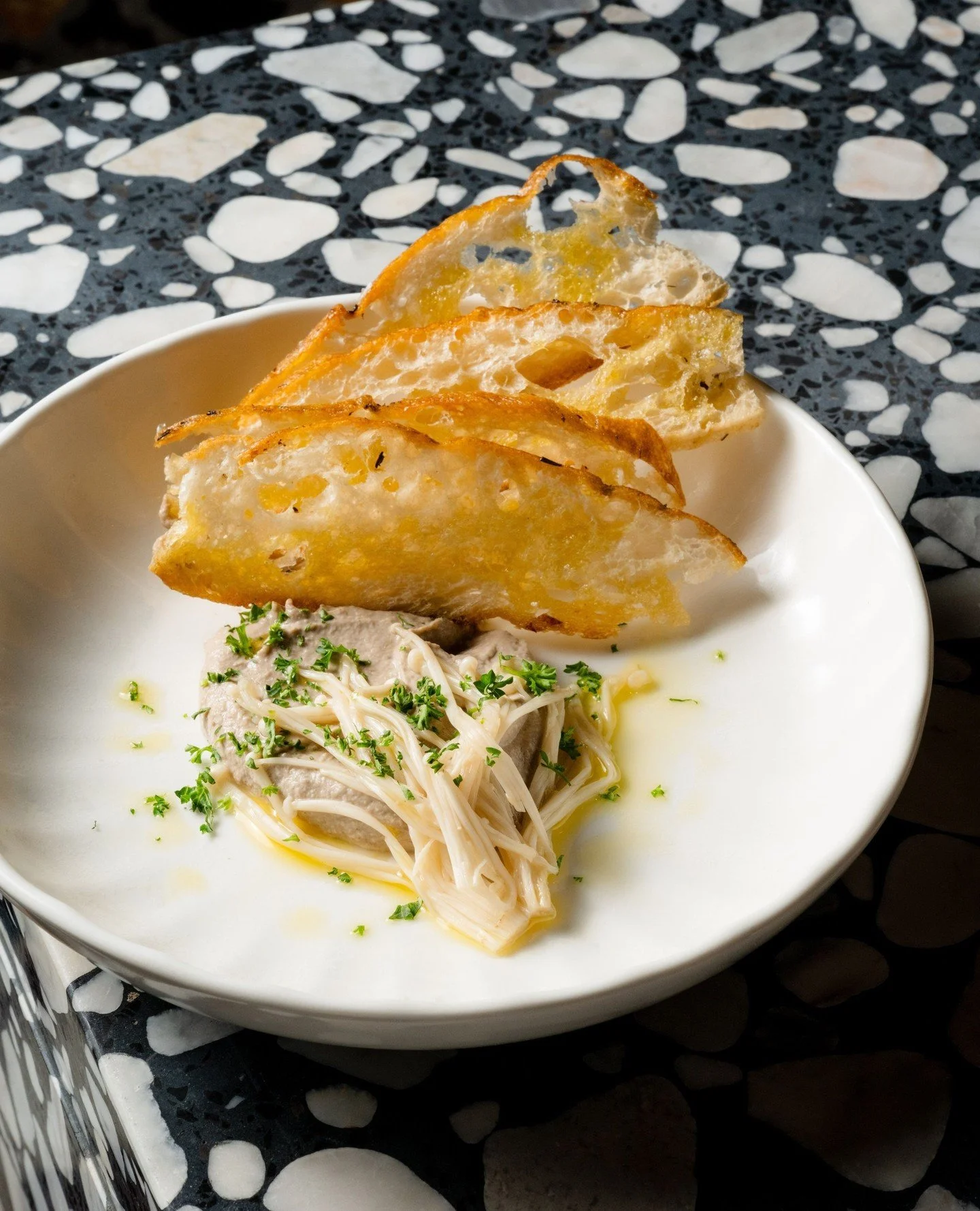 Mushroom P&acirc;t&eacute; with pickled enoki and grilled focaccia - rich, earthy and made for sharing.⁠
⁠
#OttiesMelbourne #MushroomPate #MelbourneCBD #MelbourneFood #VegetarianEats #FoodieMelbourne #SharePlates