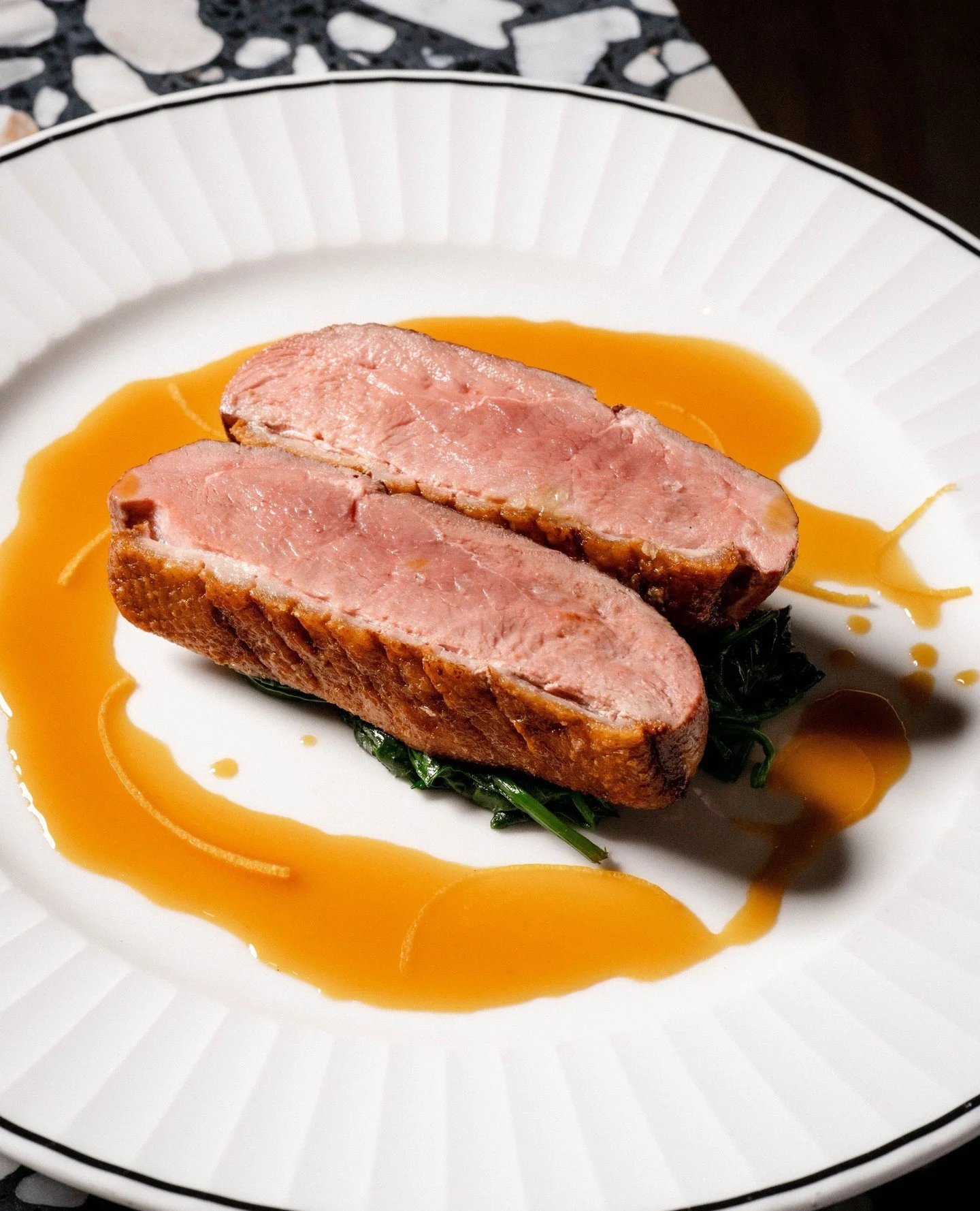 Duck &agrave; l&rsquo;Orange. Tender duck breast with wilted spinach and a bright, bitter orange sauce that balances richness with citrus lift. Now on our new menu.⁠
⁠
@crowneplazamelbourne⁠
⁠
#OttiesMelbourne #MelbourneFood #MelbourneCBD #DuckBreast