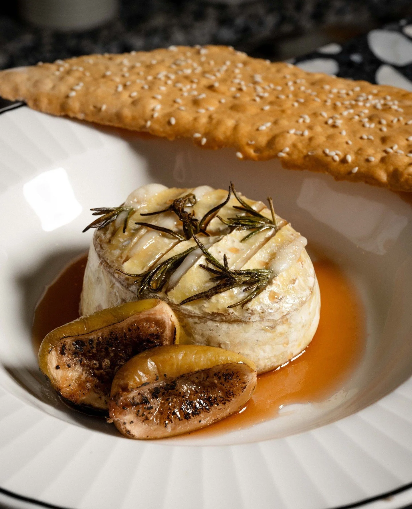 Baked brie, topped with honey figs, toasted walnuts, and a rich Port wine sauce. Warm, soft and made for sharing... or not.⁠
⁠
@crowneplazamelbourne⁠
⁠
#OttiesMelbourne #CrownePlazaMelbourne #MelbourneEats #BakedBrie #MelbourneFoodScene