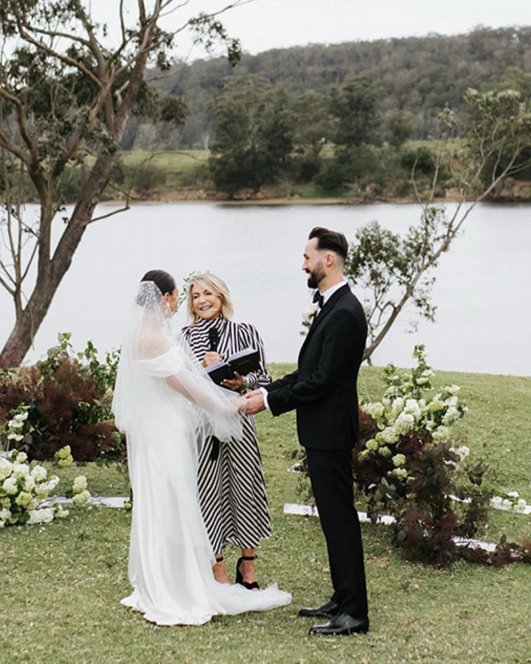 Remembering the beautiful wedding of Bree and Tim today @bundanontrust, shot by @damienmilan_photographer. The wind was so strong it blew Bree&rsquo;s veil away!
