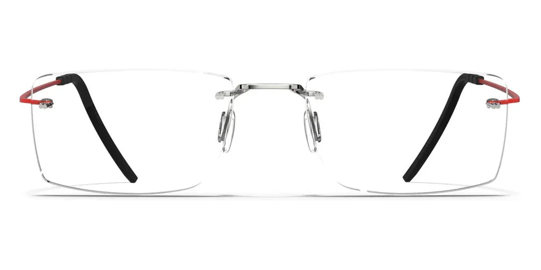 A pair of rimless eyeglasses with a sleek silver bridge and black and red temple arms.