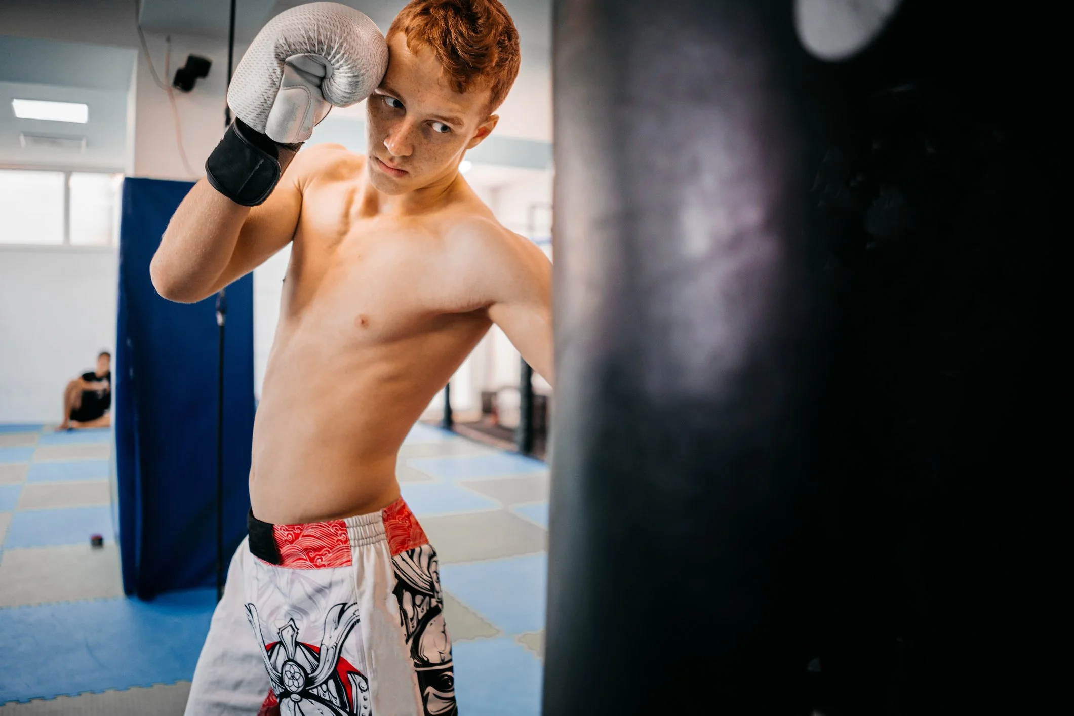 Teenage boxing punching bag.jpg