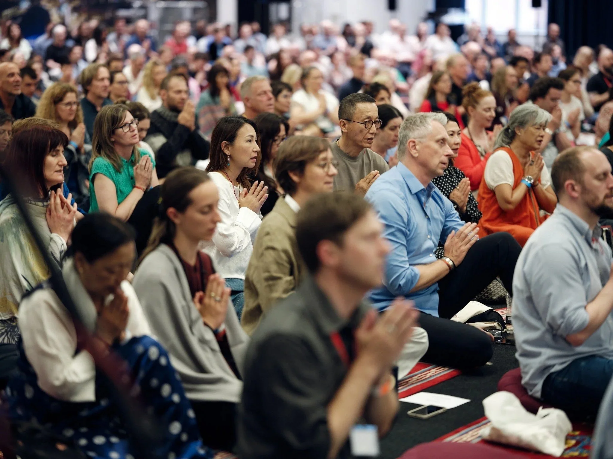 Participants at teaching by His Holiness 17th Karmapa, Trinley Thaye Dorje, hosted by Dechen Manchester, July 2024