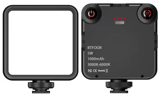 A softbox light on the left and the back of a LED panel light on the right showing power button and controls.