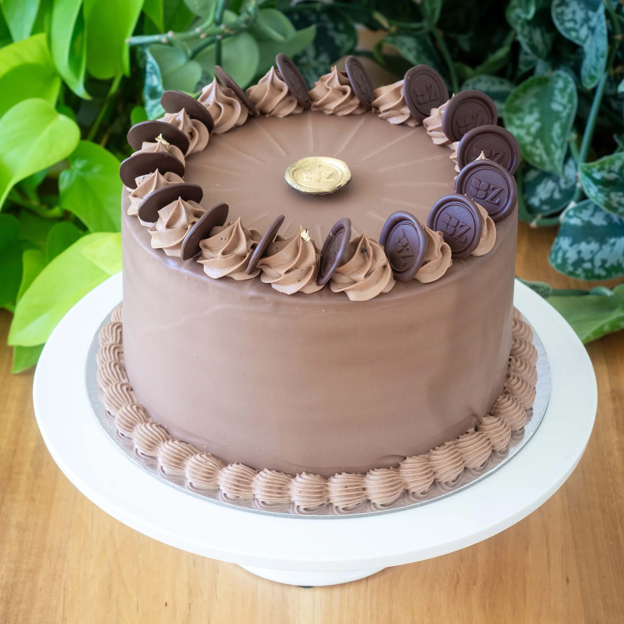 a chocolate covered multi layered German Prinzregententorte cake