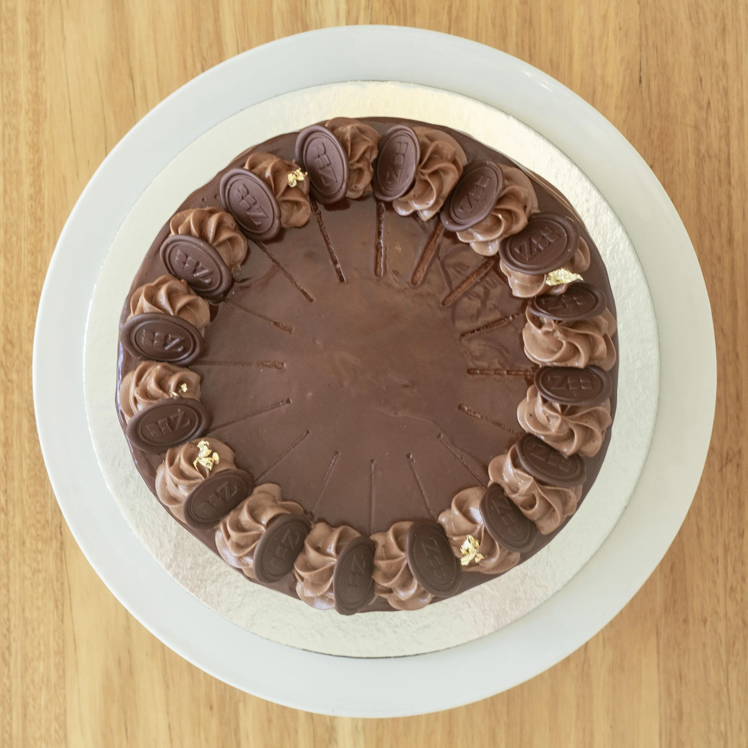 the view from above of a chocolate covered multi layered German Prinzregenten cake