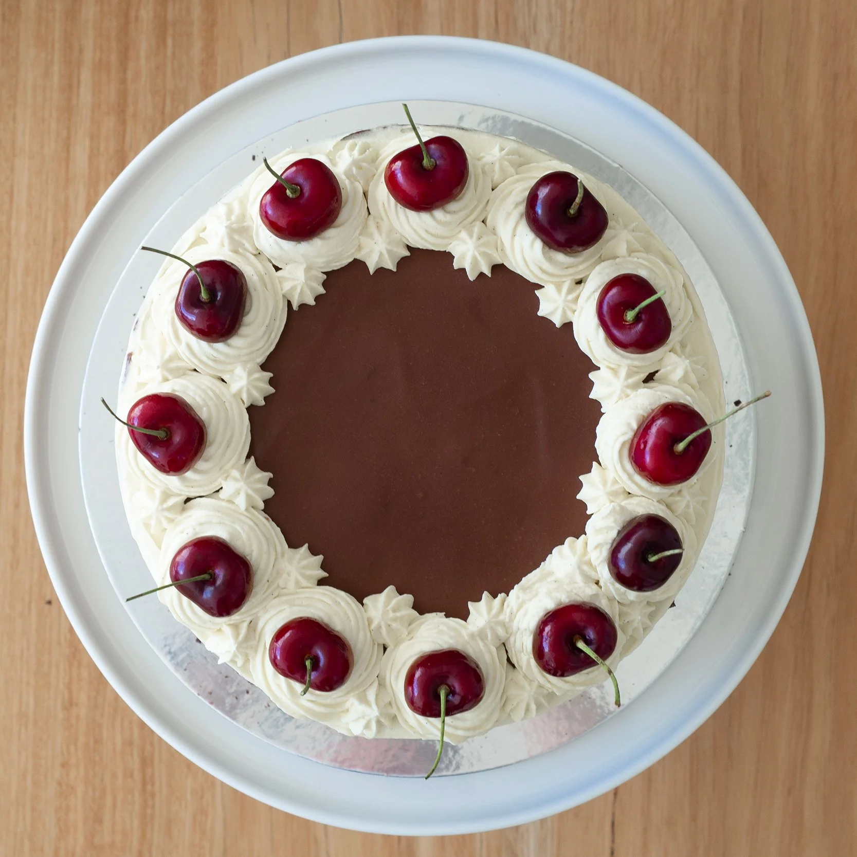 a view from above or a Black Forest Cake or Schwarzwälder Kirschtorte with cherries