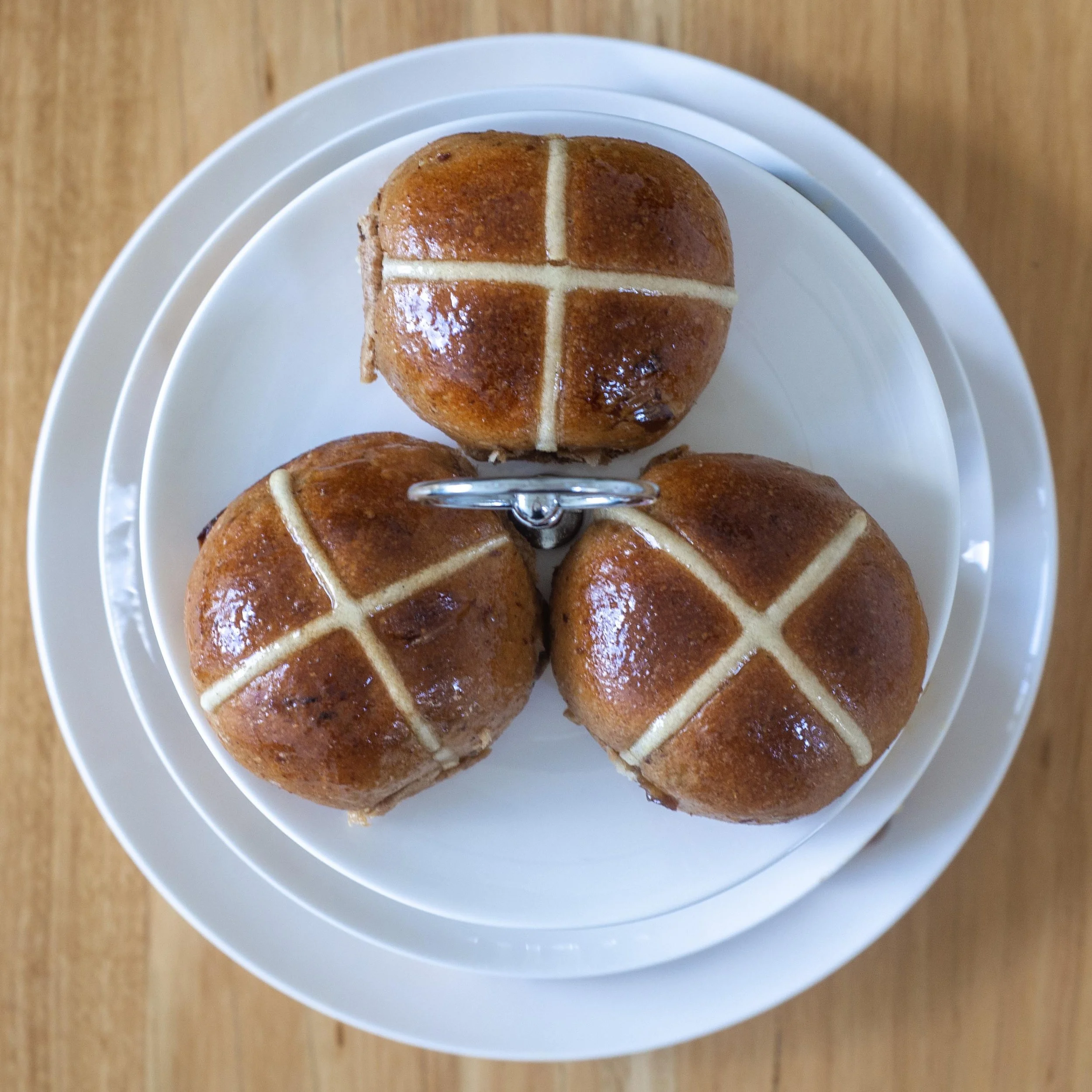 a view of three hot cross buns from above