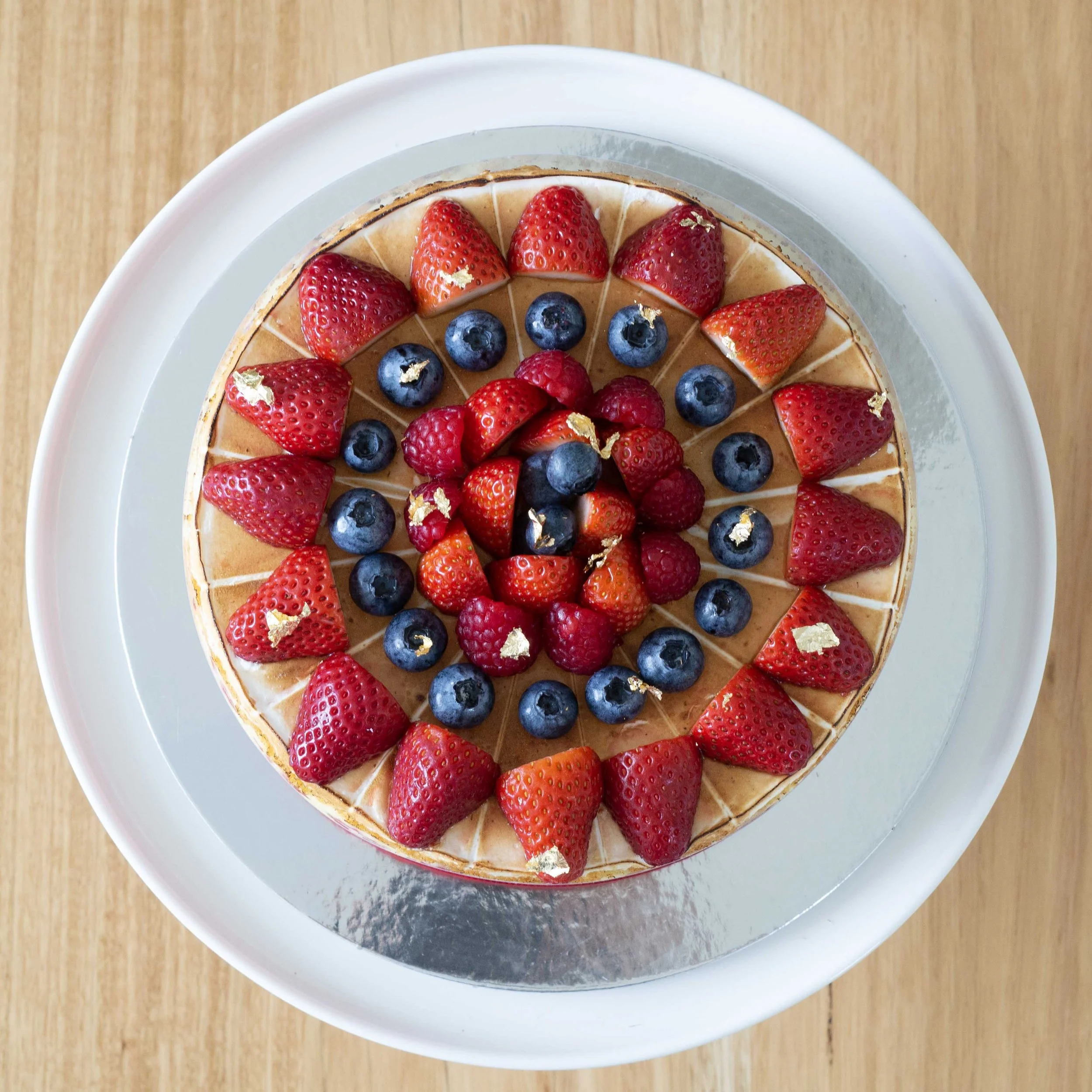 a french strawberry cake or fraisier viewed from above