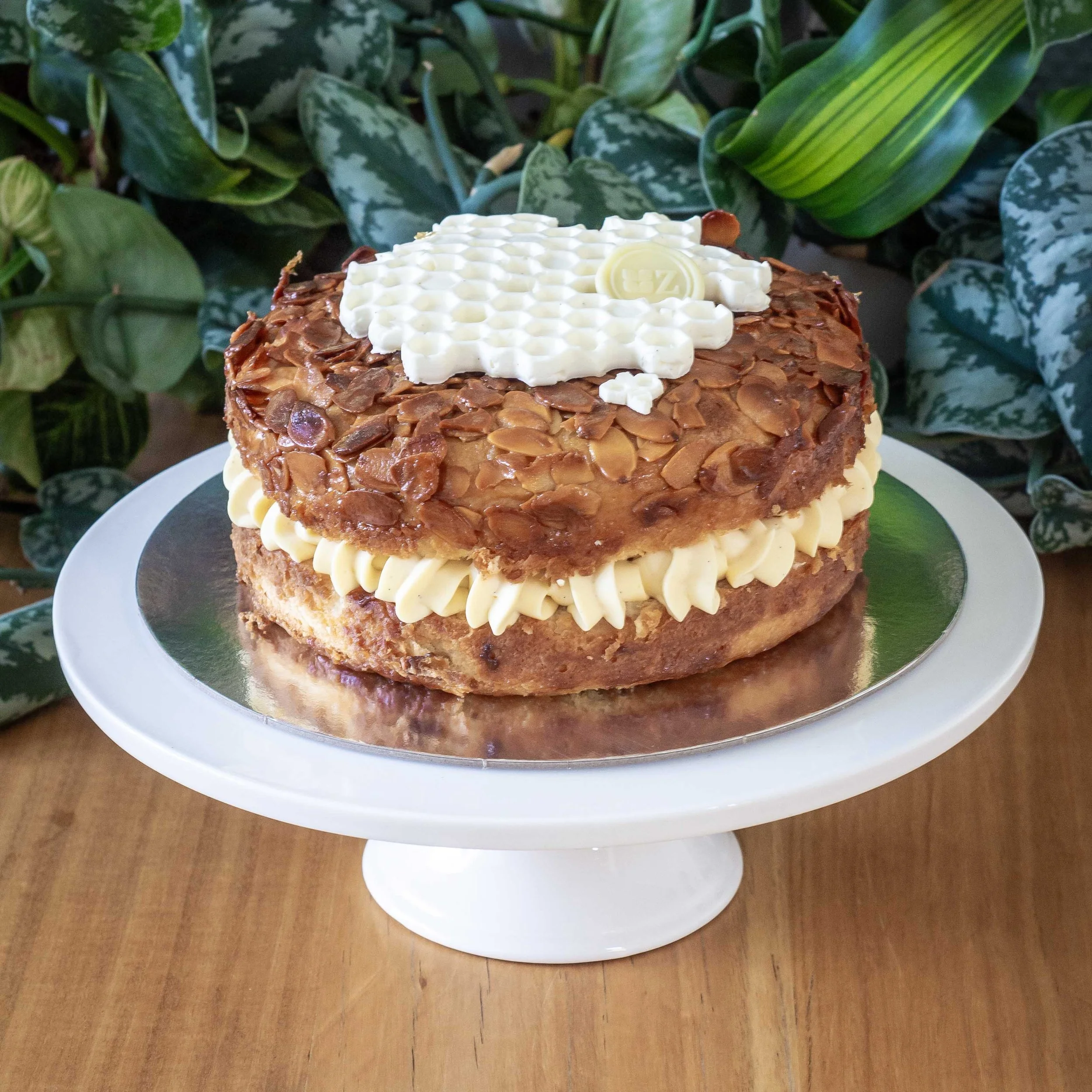 a Bienenstich or Bee Sting Cake on a cake stand
