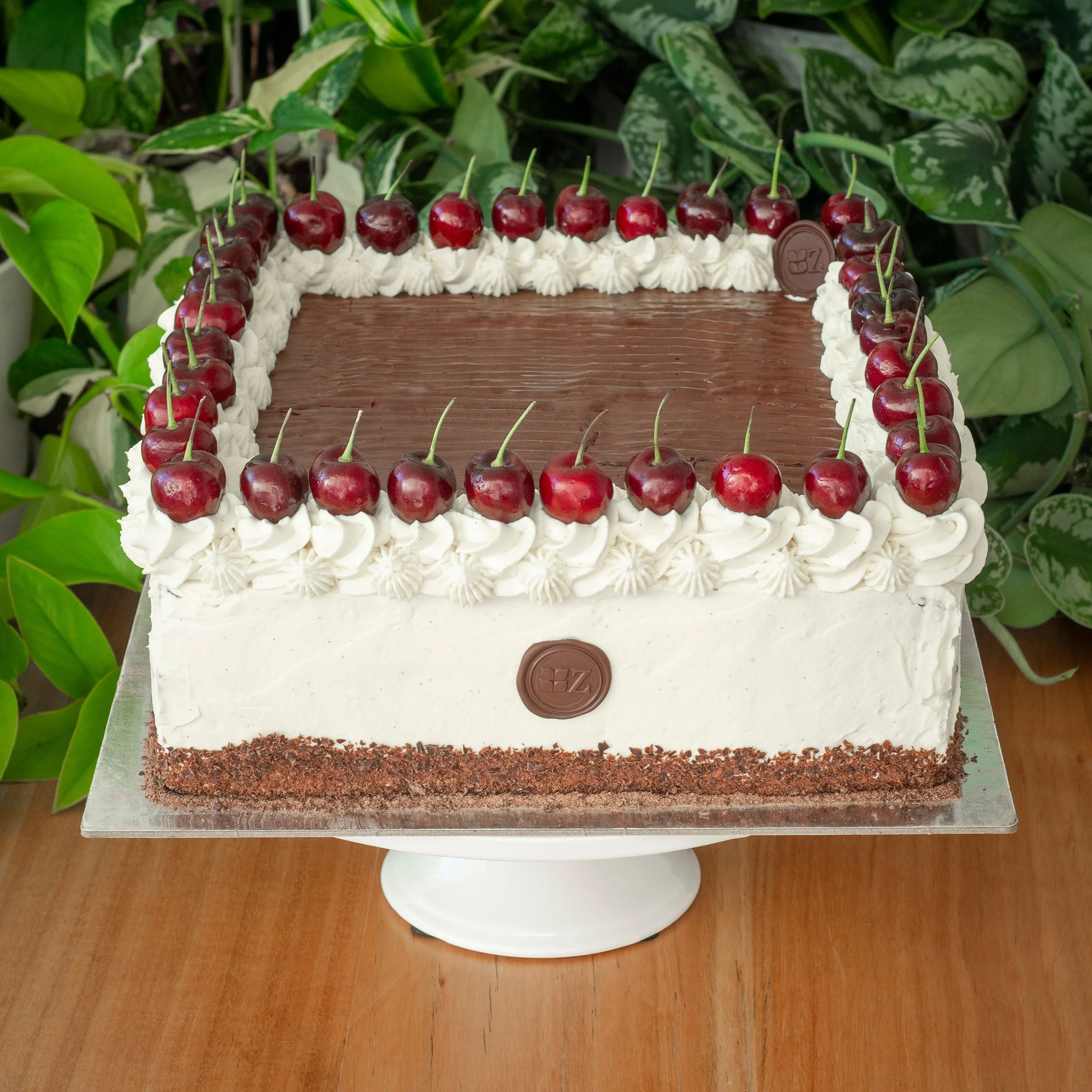 a large Black Forest Cake or Schwarzwälder Kirschtorte with cherries caters for large celebrations