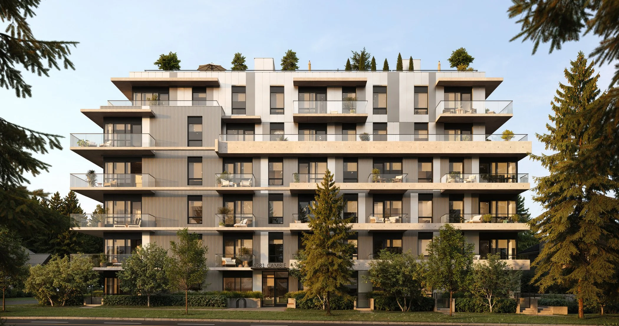 Modern multi-story apartment building with large glass balconies, surrounded by trees and greenery, under a clear sky.