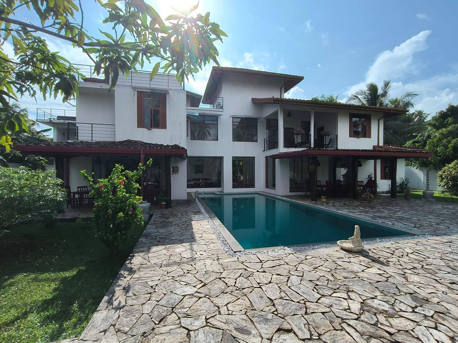 receiving-retreat-outside-of-the-villa-where-you-can-see-the-pool.jpg