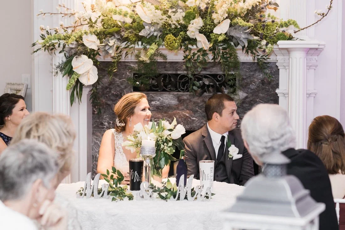 paige-and-shaun-in-front-of-the-fireplace_orig.jpg.webp