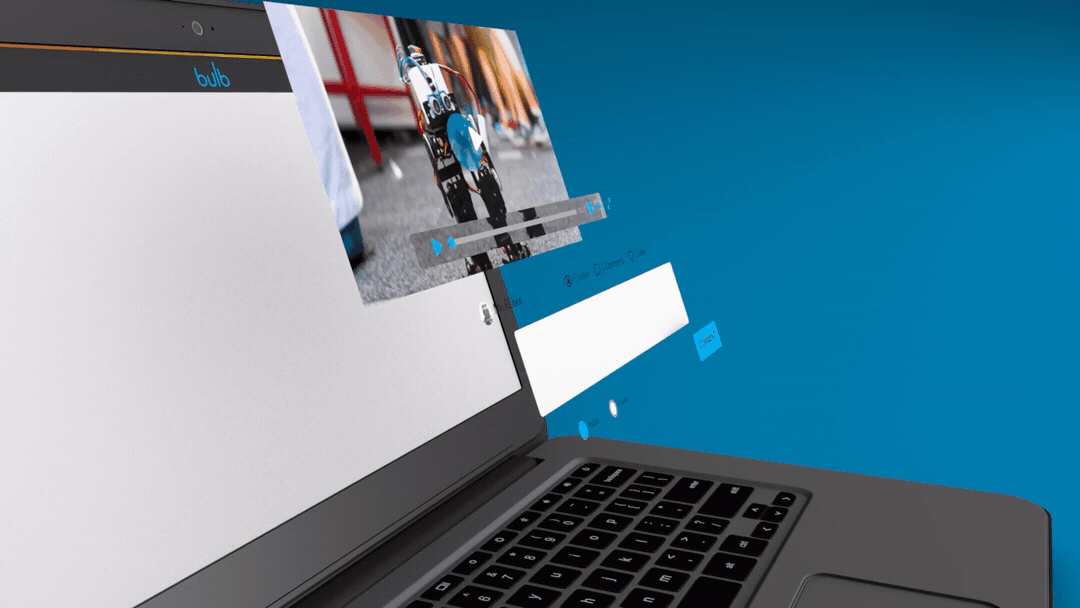 Laptop computer displaying video editing software with a video of a robot in a workshop.
