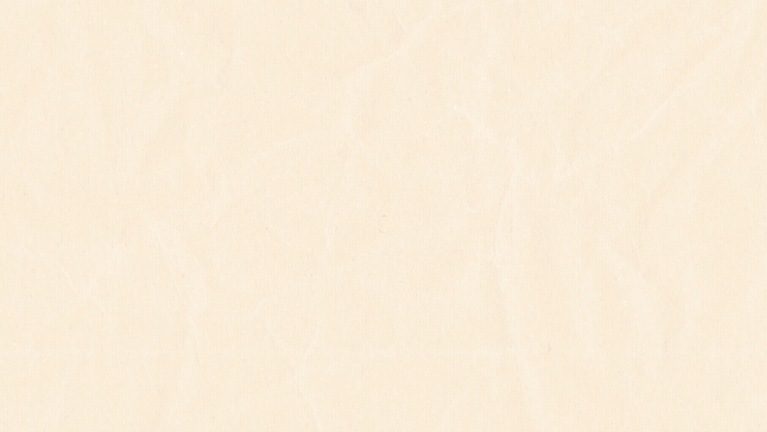 Close-up of a vanilla ice cream cone with a plain paper background.