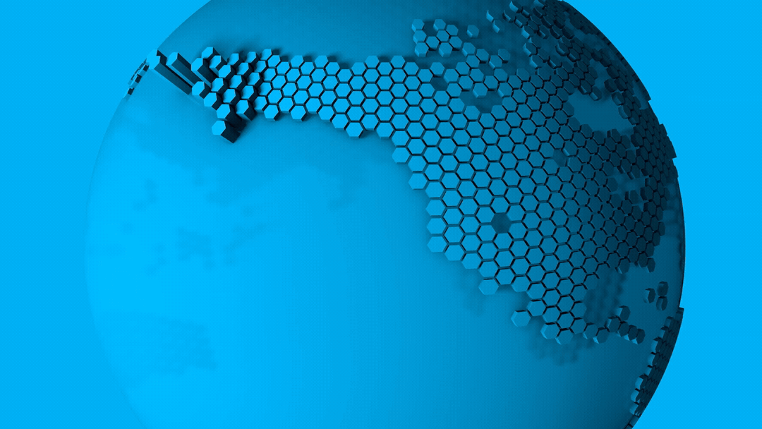 Digital globe with hexagonal pattern highlighting North and South America against a blue background.