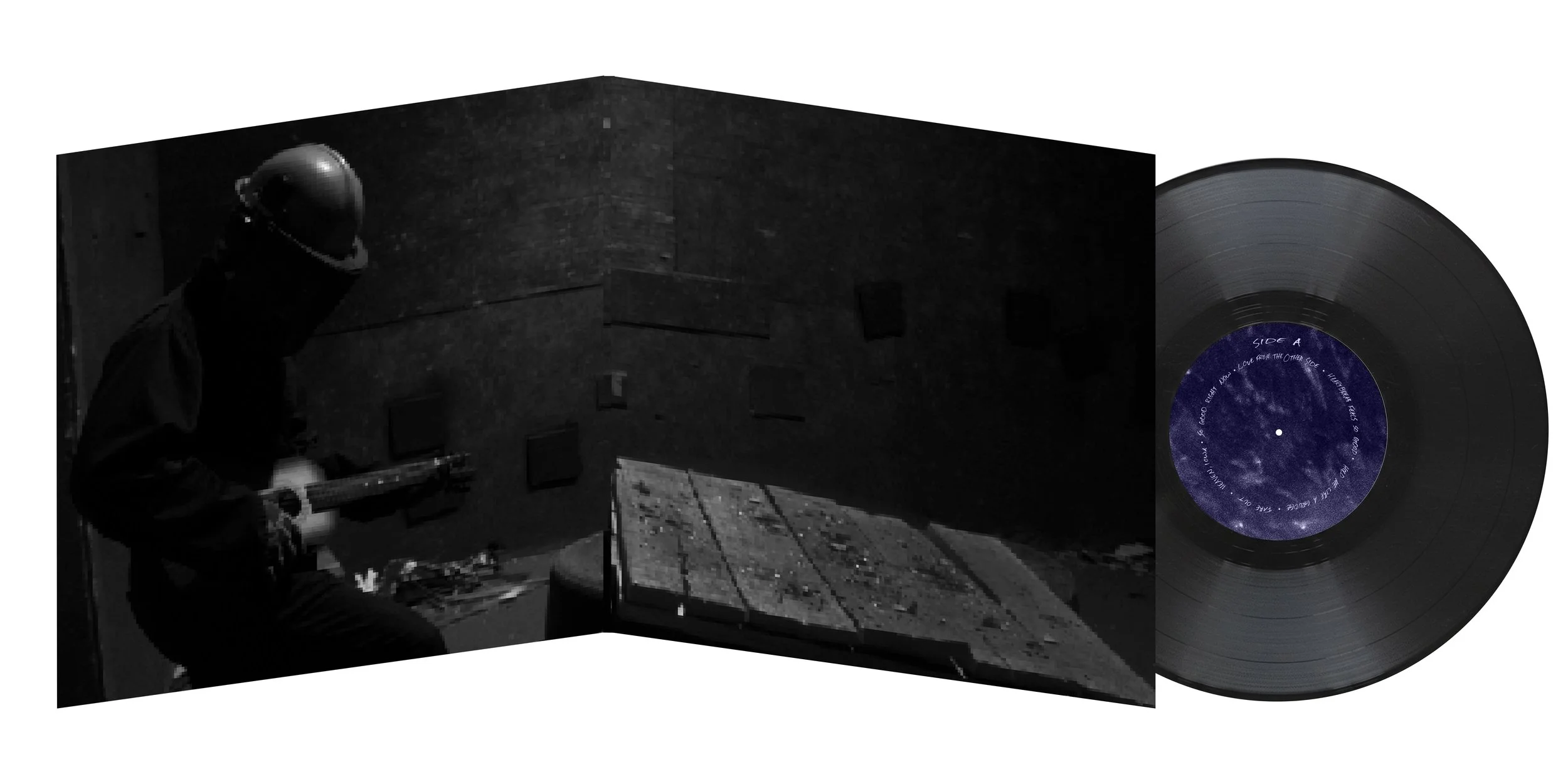 A black and white photograph of a person wearing a helmet and dark clothing, working with tools in an outdoor space with brick buildings. A vinyl record with a purple label is placed next to the photo.