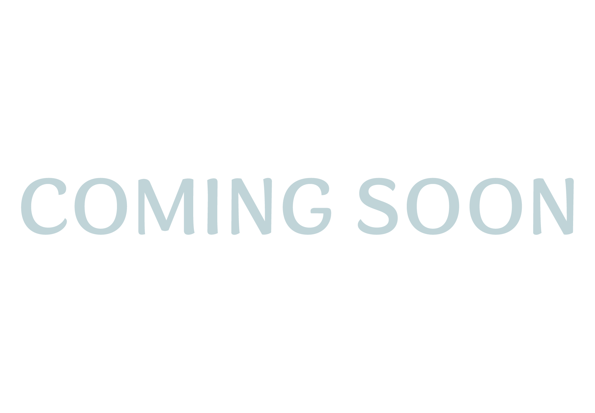 Centered text on a white background reading "Coming Soon" in light gray, large font.