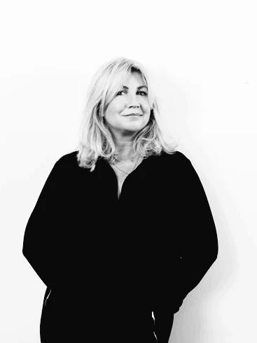 Here is a photo of Jackie Maratier, one of our Linkcredibles. She has blonde hair, and is wearing a dark top, standing against a plain white background.