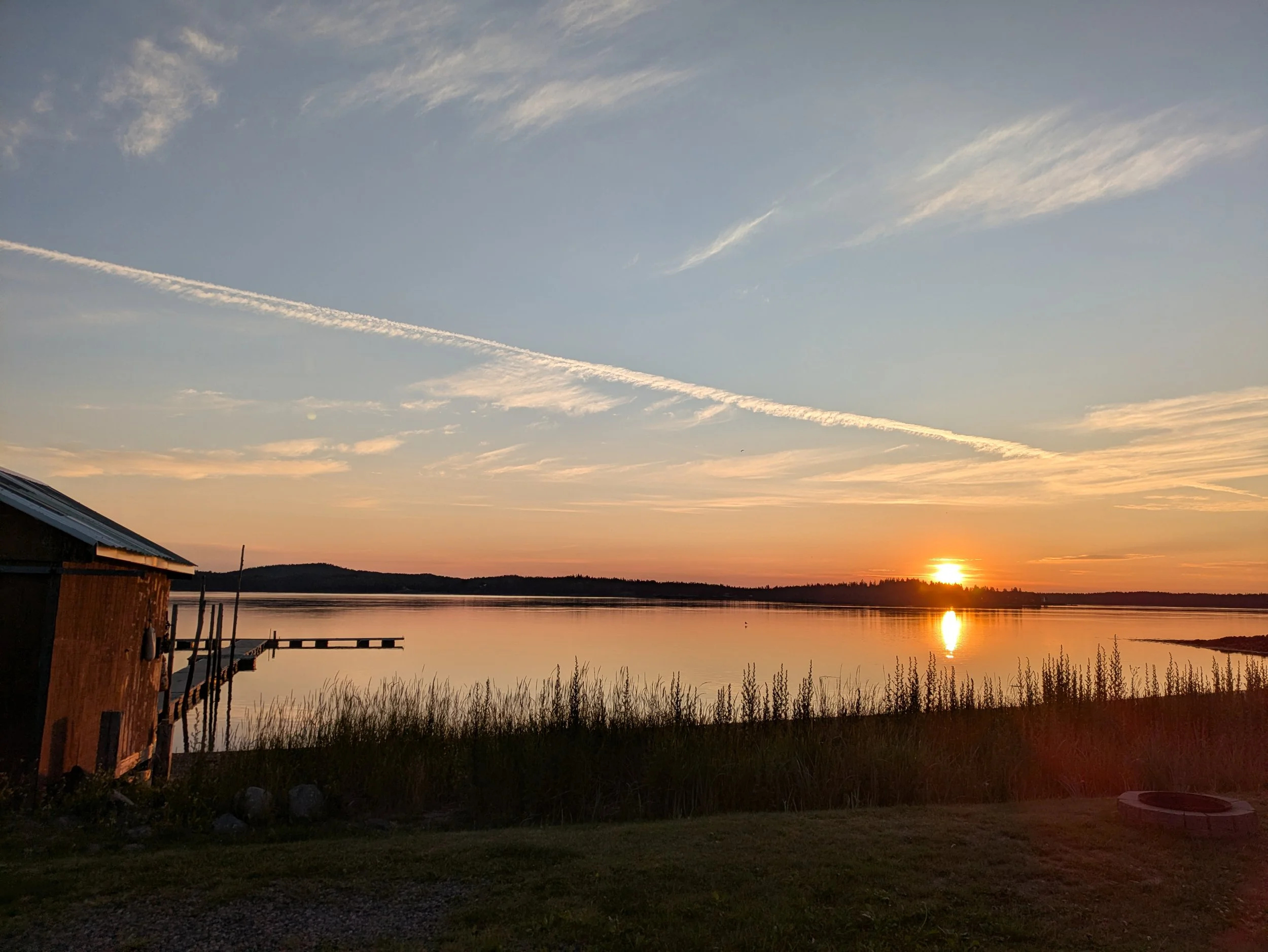 Sunrise over a coastal scene in Eastport Maine.