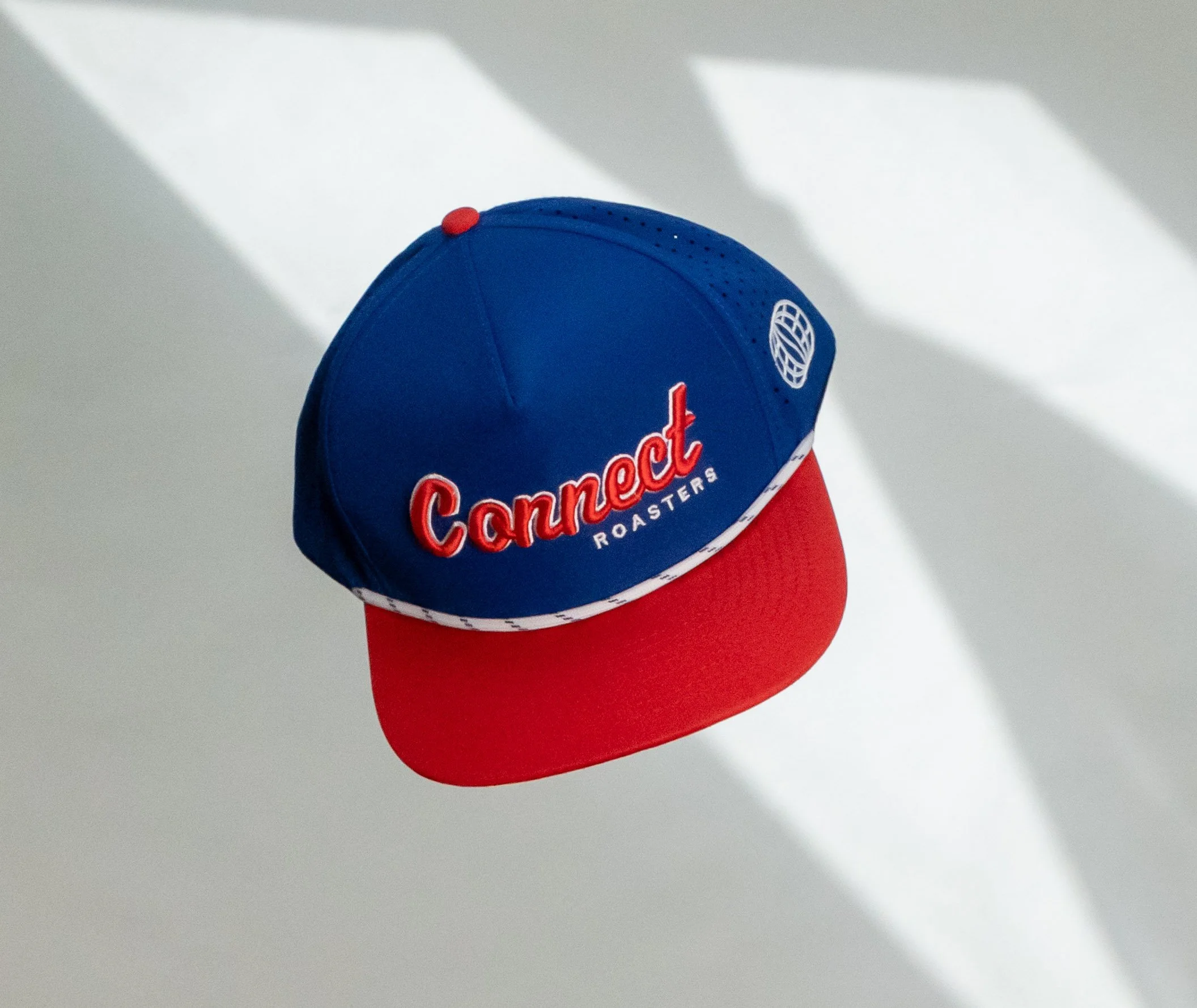 A blue and red baseball cap with 