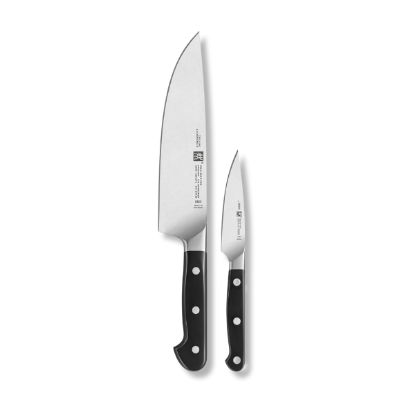 A set of 2 Zwilling Pro knives, a chef's knife and a paring knife with black handle