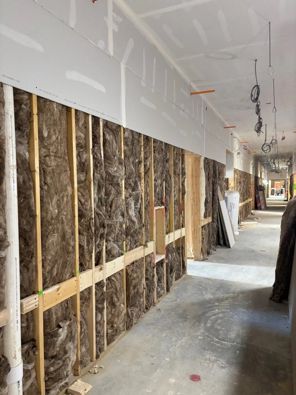 Last phase of drywall being hung 