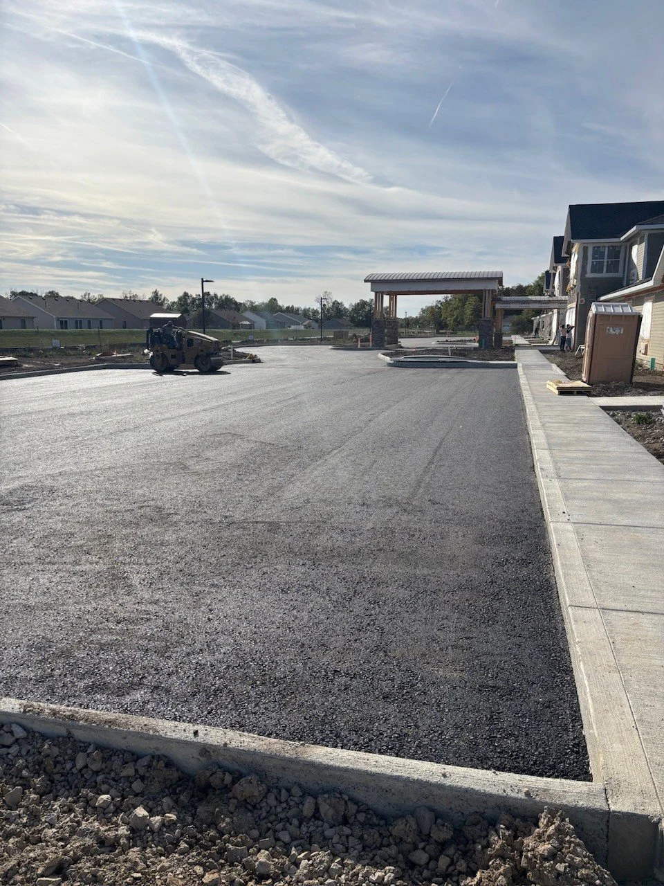 Getting pavement down around the main building 