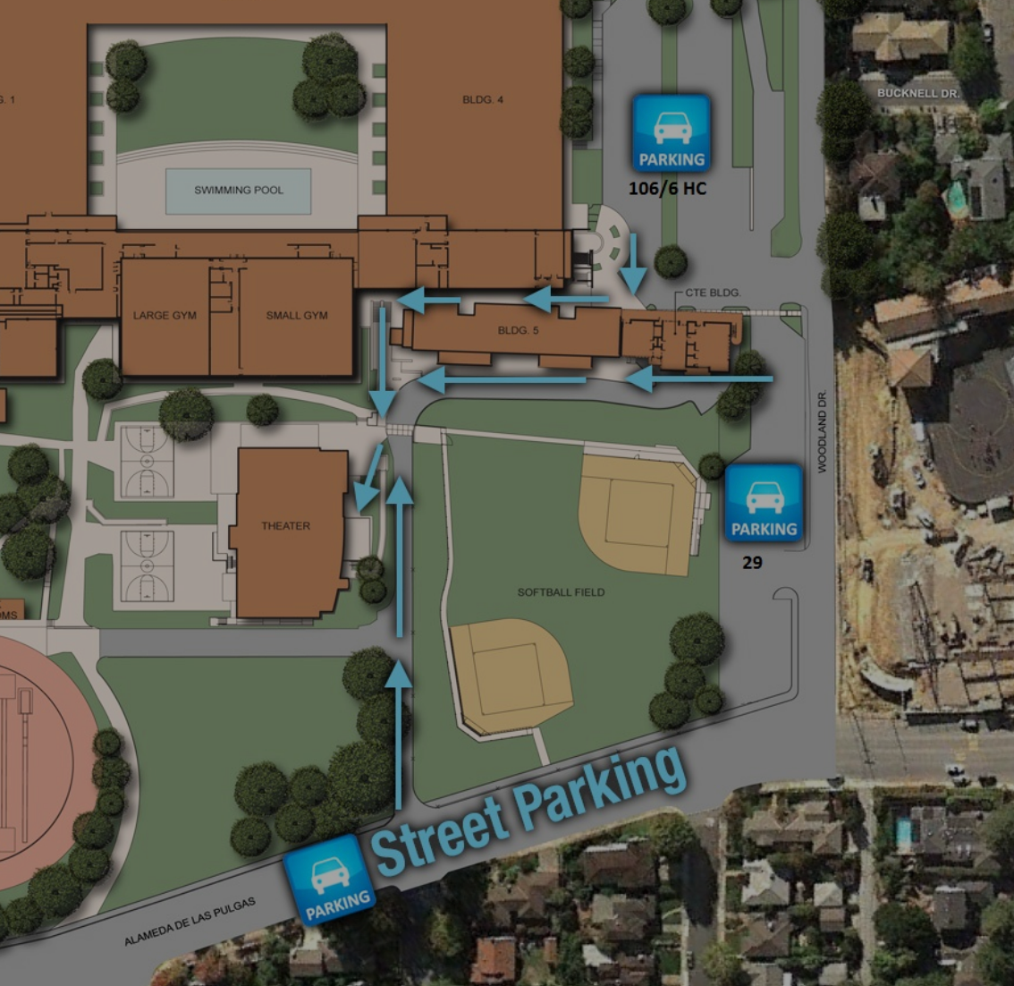 Map showing campus layout with parking areas, buildings, swimming pool, gym, theater, softball field, and directional arrows for vehicle flow.