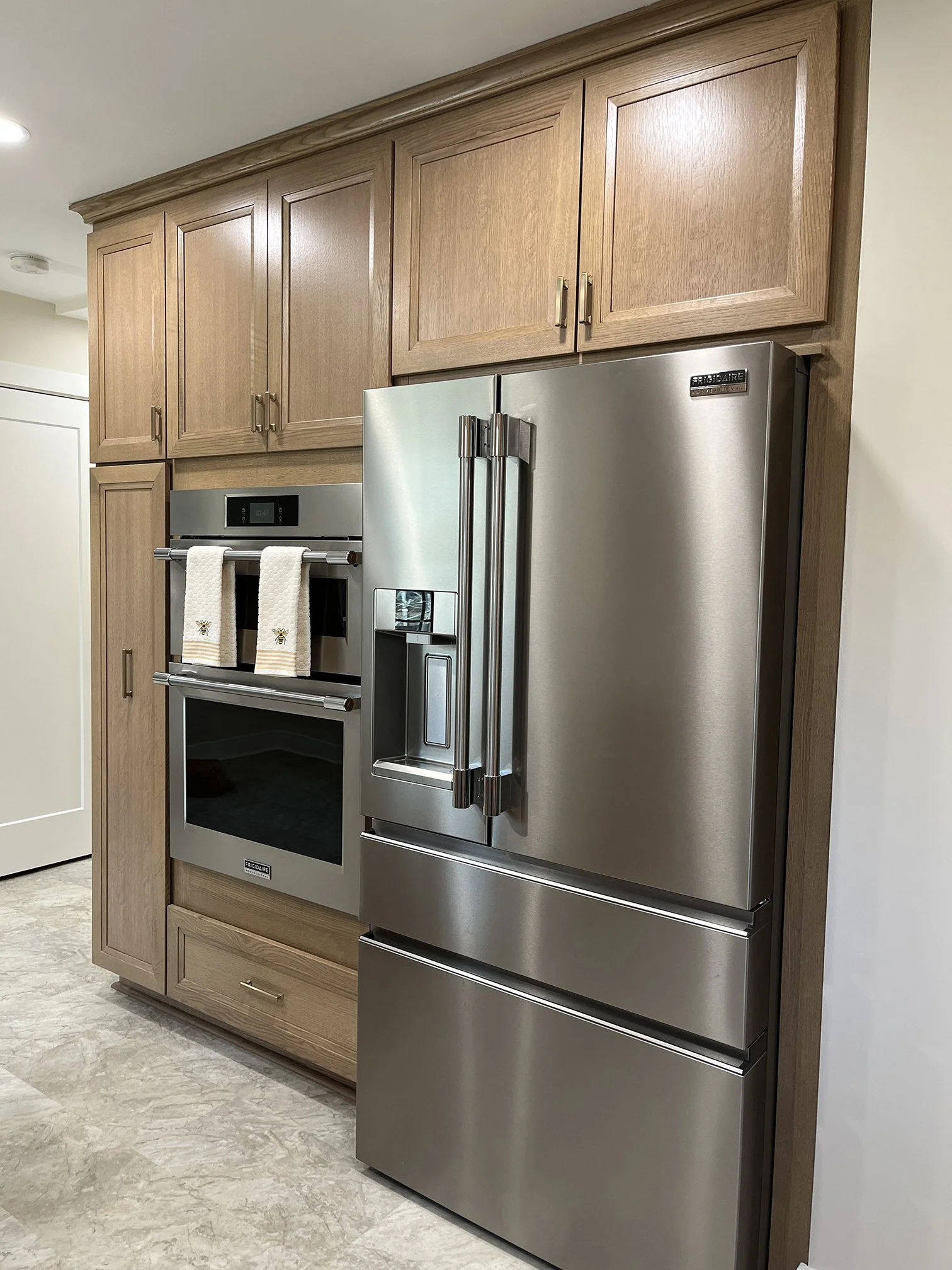 AFTER–Full height cabinets, dual wall oven