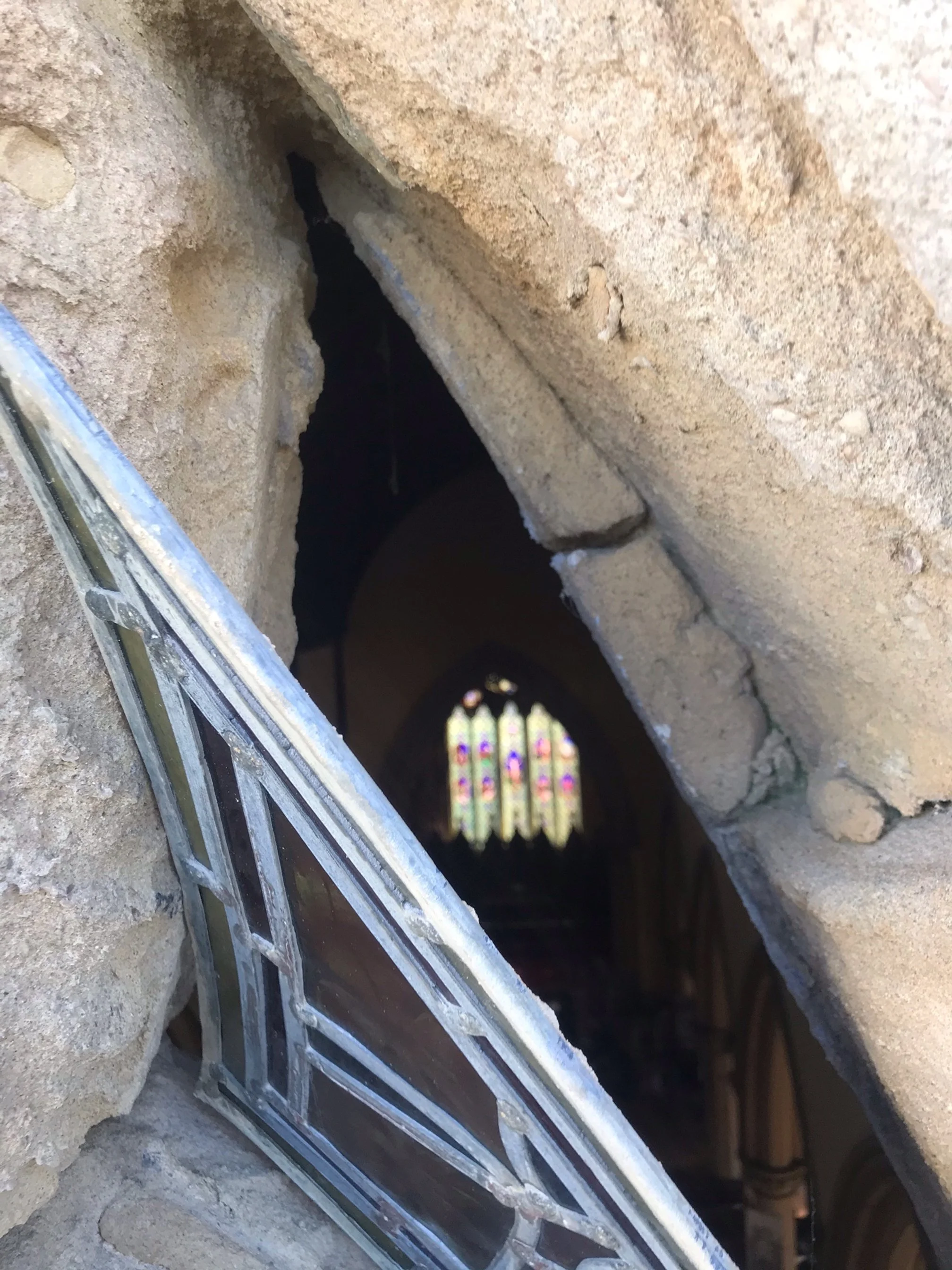 damaged stained glass and tracery.jpeg