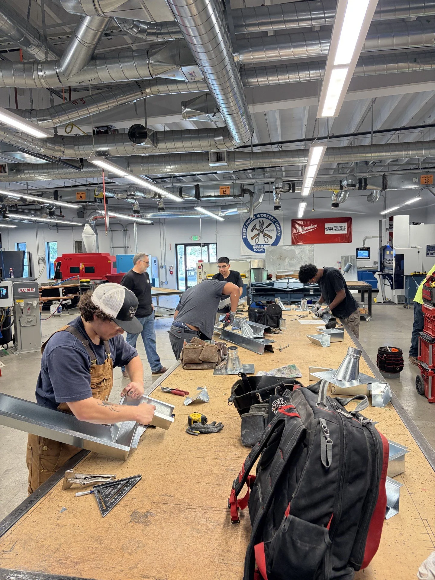 Third-Year Apprentices Master Gutter Miter Fabrication