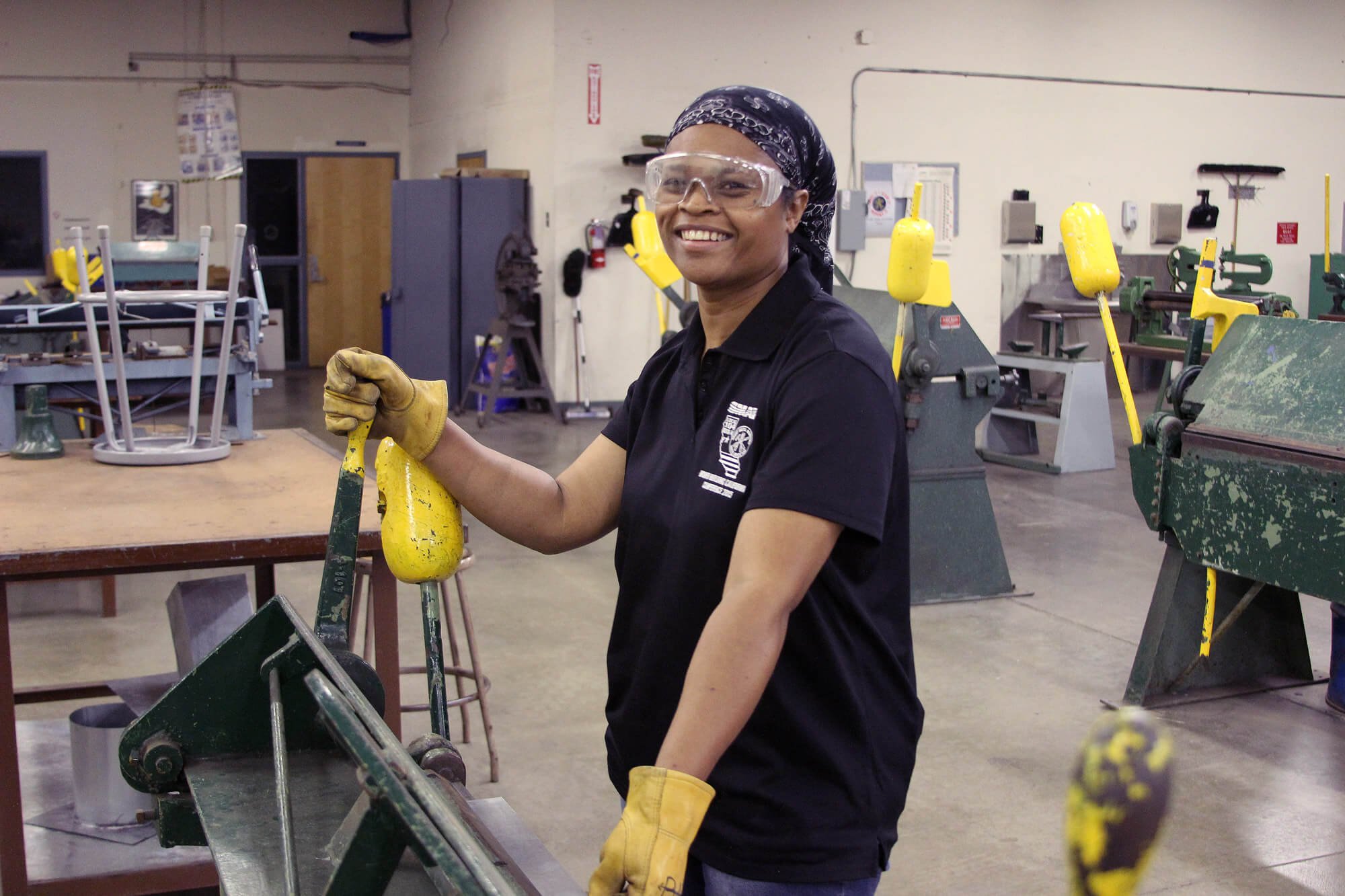 Woman Apprentice at SMTC  with protective glasses on