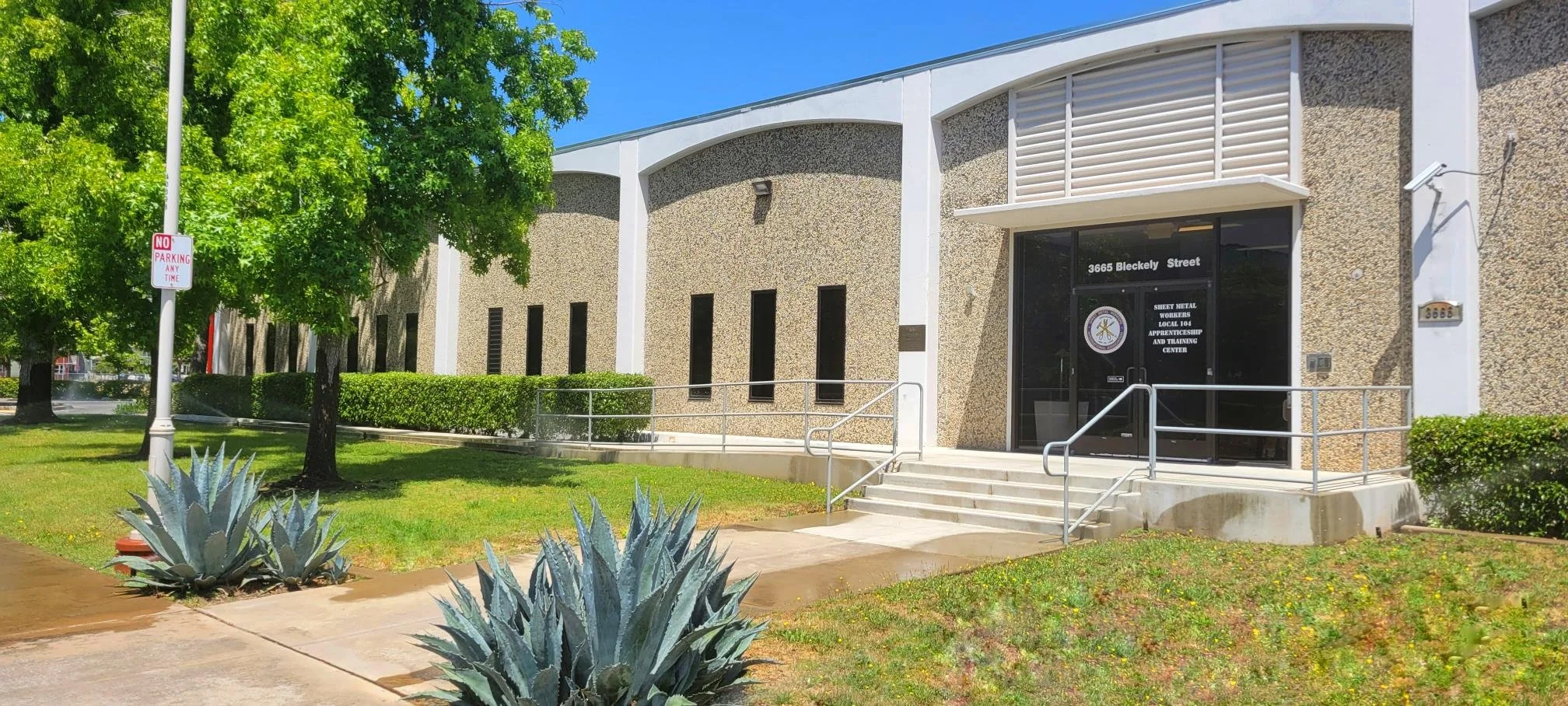 The image shows the entrance of a building with the address 3665 Bleckely Street, SMTC.