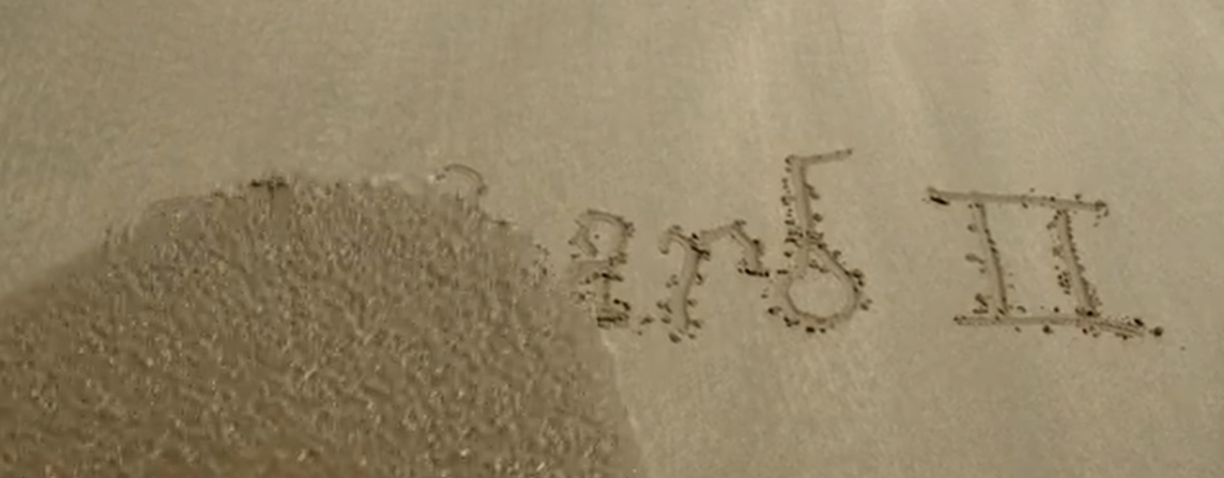 From the Hollow Crown (2012), depicting Richard II's signature written in the sand then is washed away by the waves.