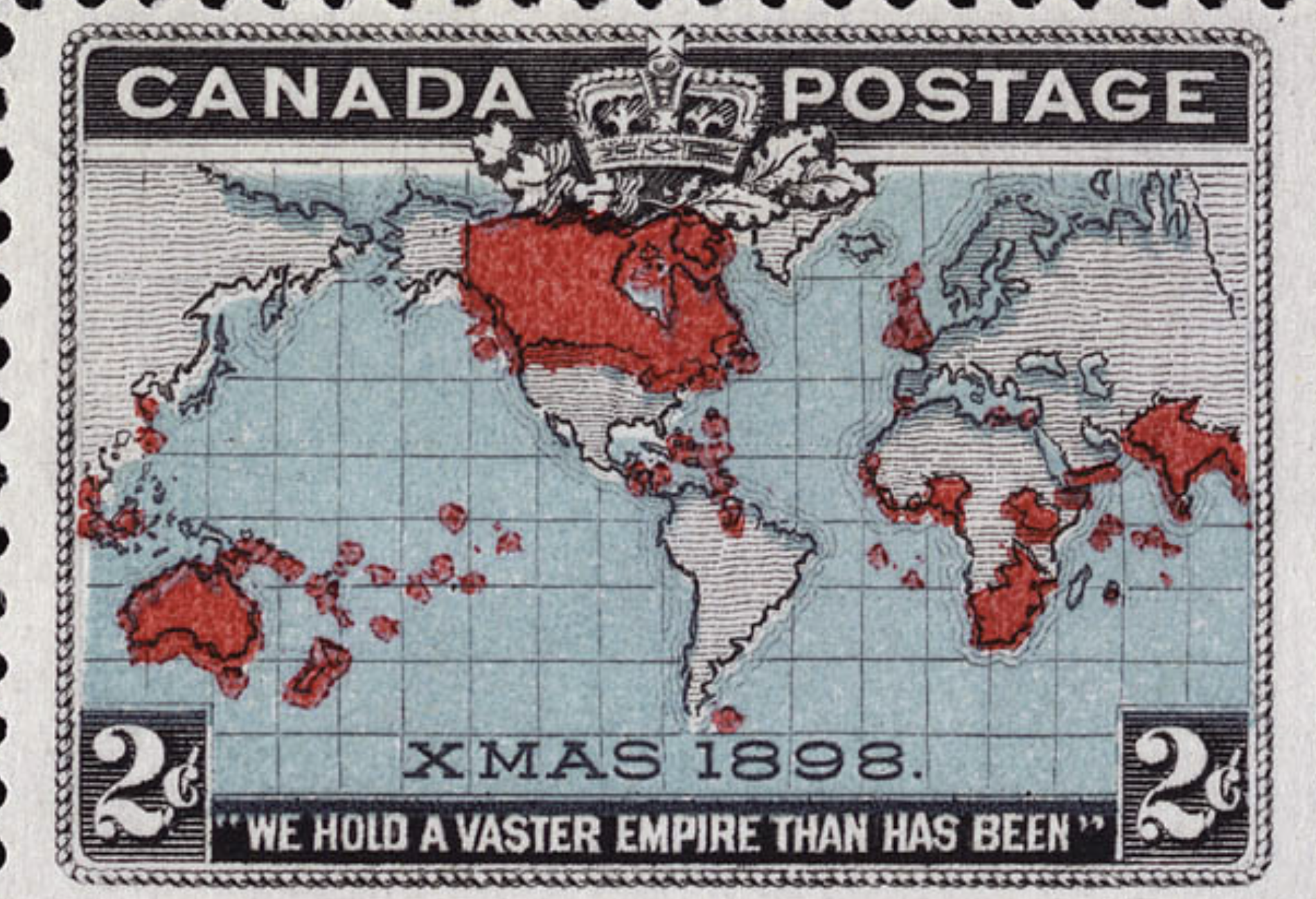 A historic stamp with Canada postage written at the top and  'Xmas 1898', "we hold a vaster empire than has been" at the bottom. Depicts world map, with British empire areas in red.