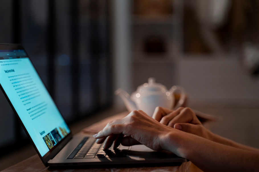 A therapist writing her blog post on her website - The Passive Practice