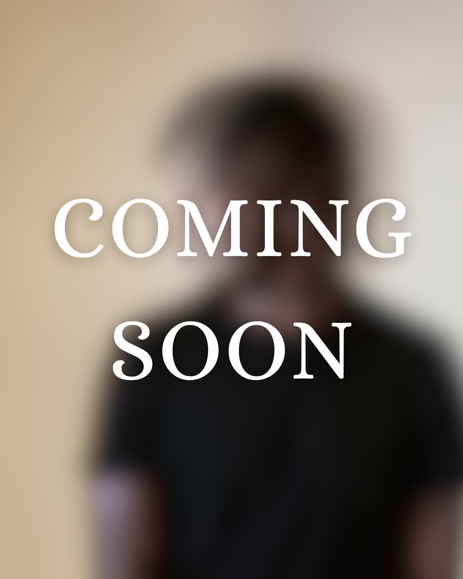 A blurred out portrait photo of an african american man wearing a black t-shrit with the words coming soon over the top of the image