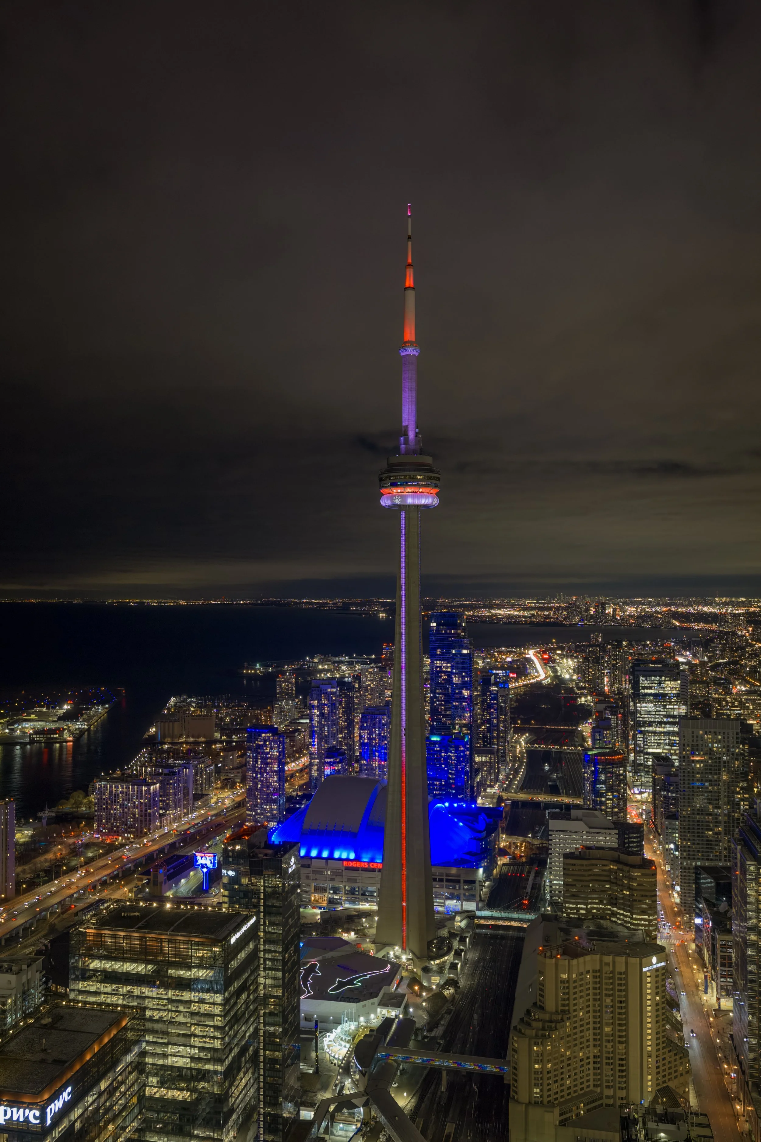 CN Tower shining bright above Rogers Centre tonight