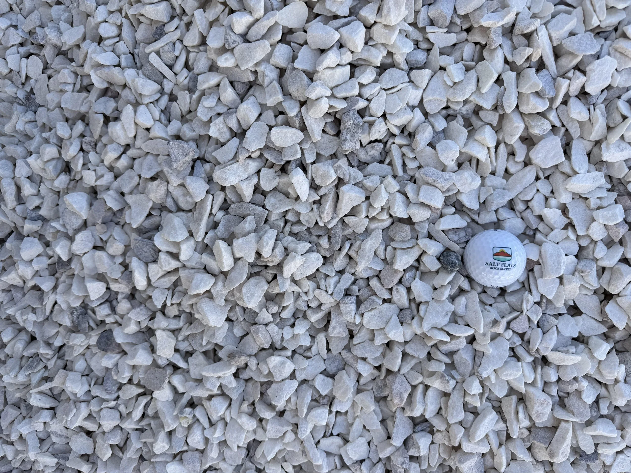 Arctic Pearl Chips 3/4 inch minus white decorative landscape rock available in Syracuse Utah